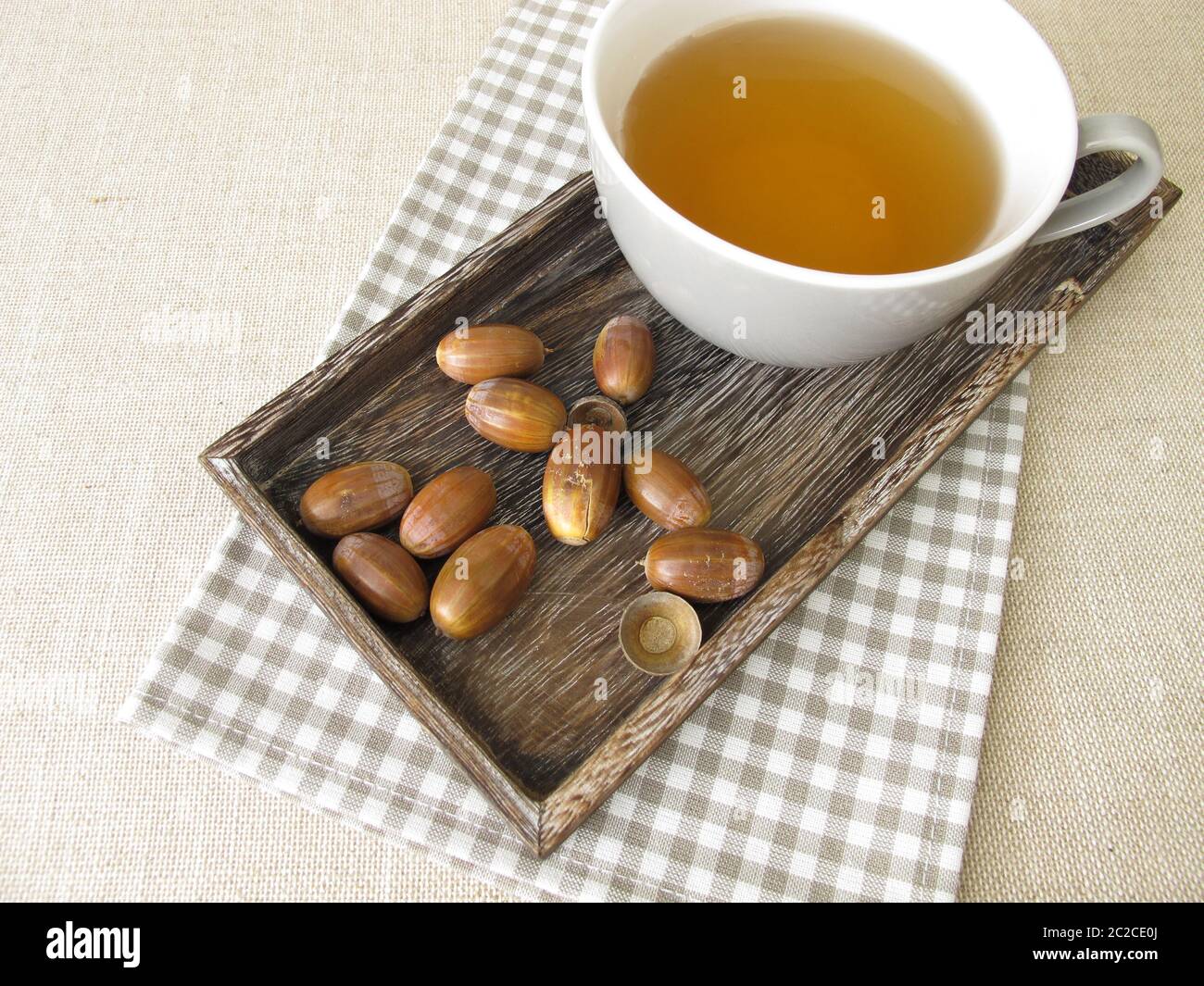 Acorn coffee from roasted acorns on a tray Stock Photo