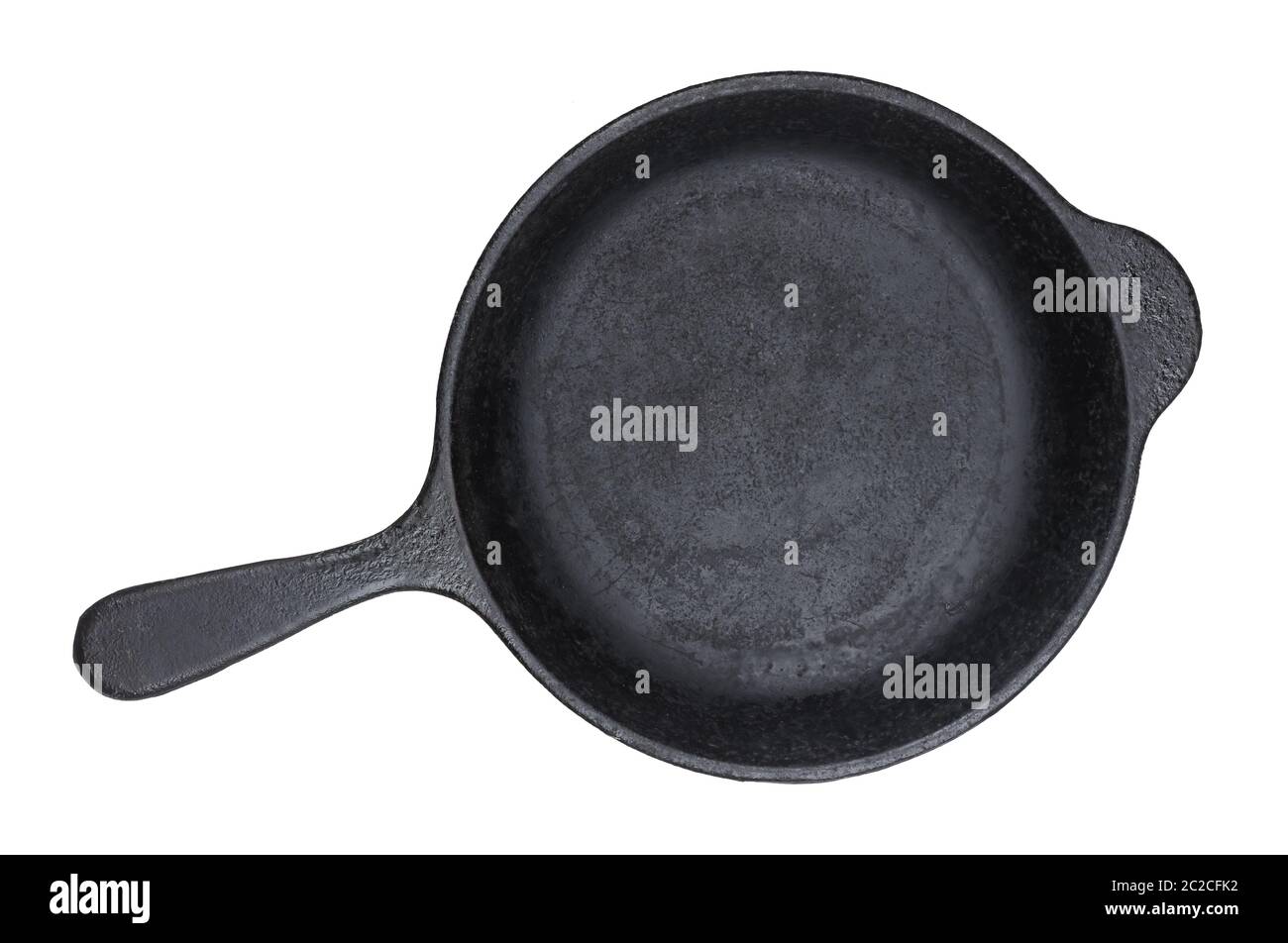 Old cast iron pan isolated on white background, top view Stock Photo Alamy