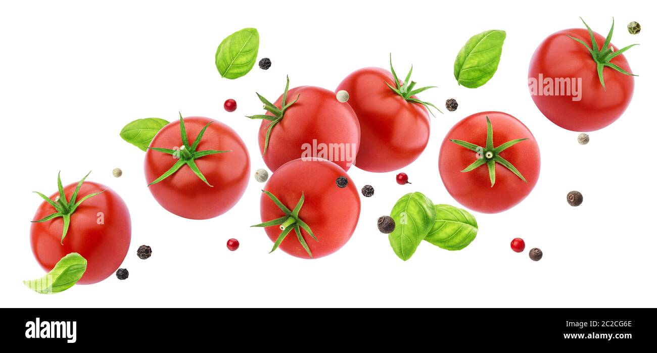 Falling tomatoes salad isolated on white background with clipping path ...