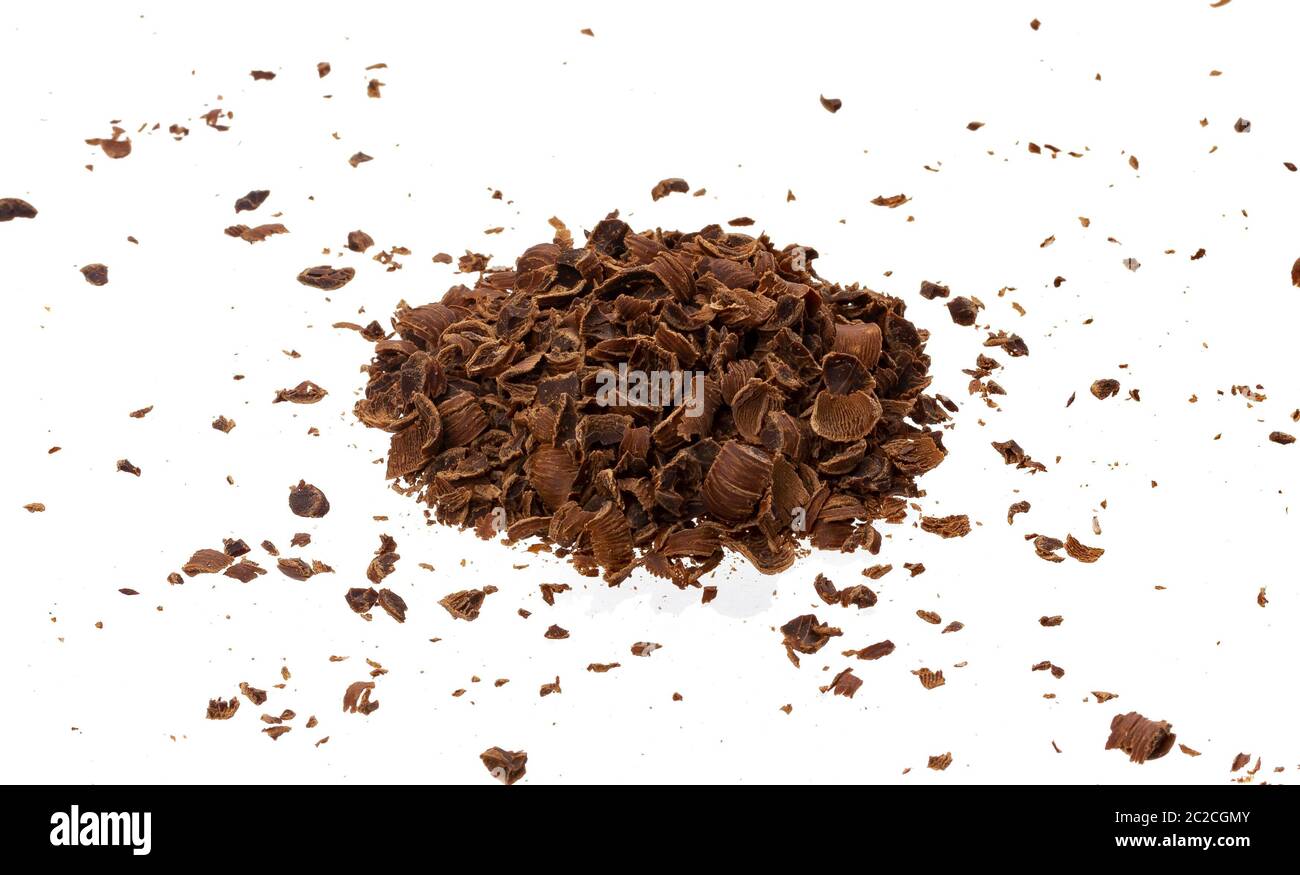 Grated chocolate. Pile of ground chocolate isolated on white background