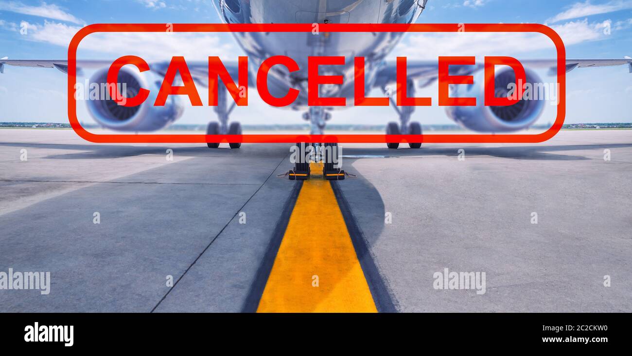 cancelled flight, airliner with a cancelled stamp Stock Photo