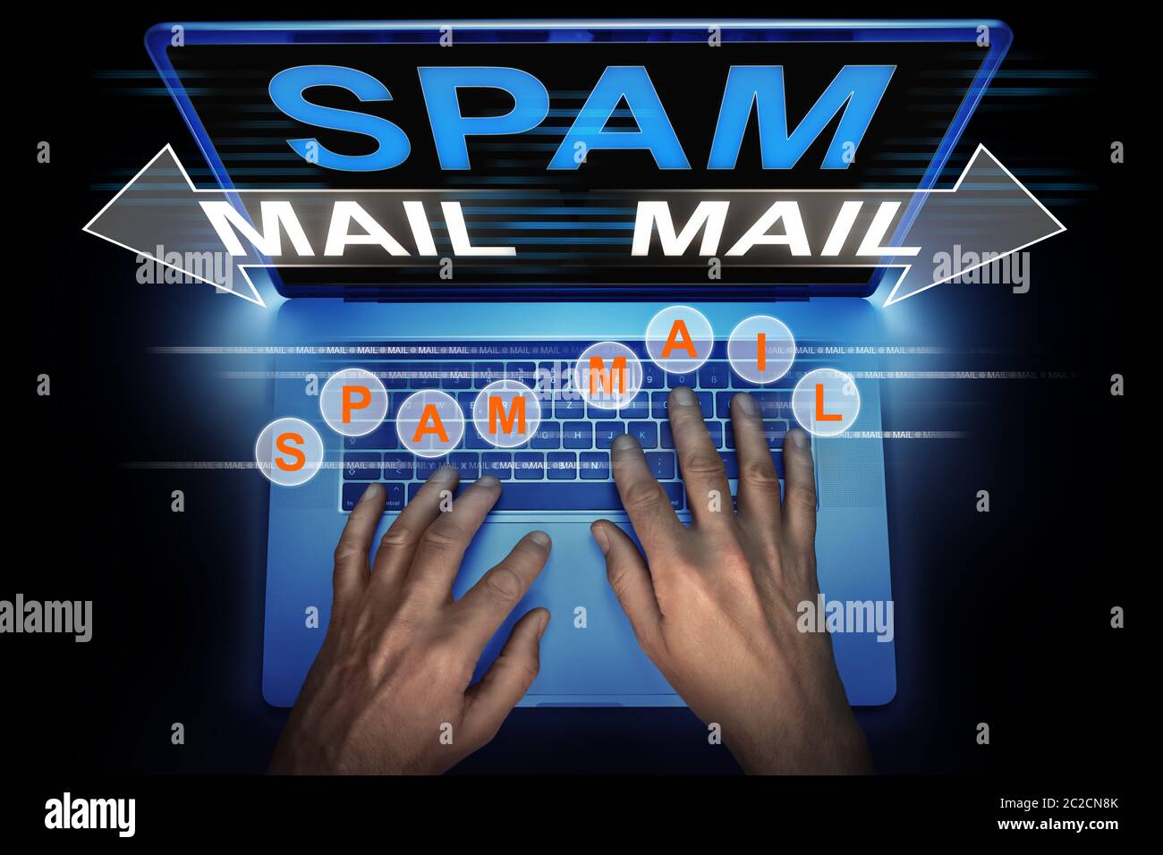 hacker spreads spam mail from his computer Stock Photo