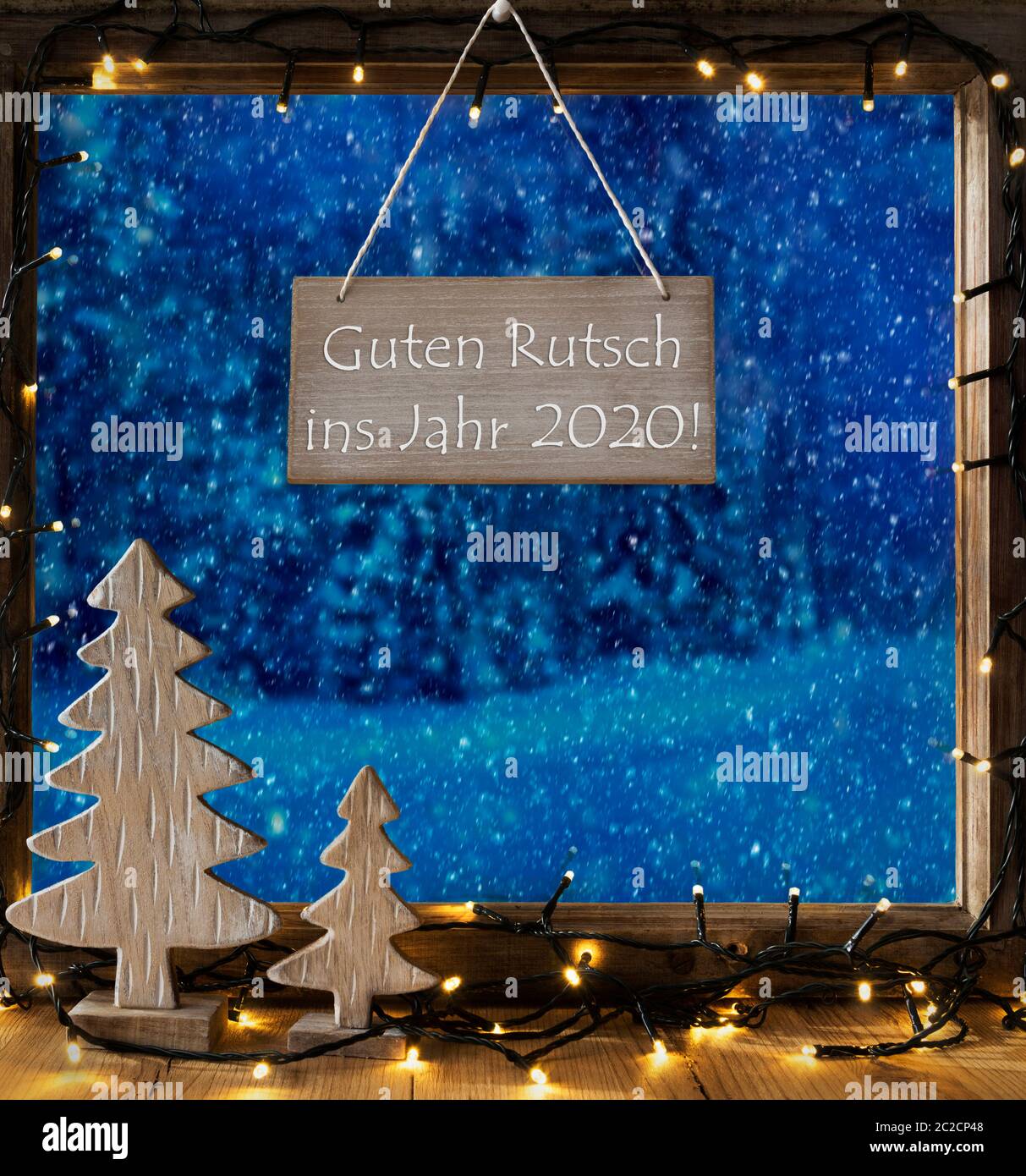 Sign With German Text Guten Rutsch Ins Jahr 2020 Means Happy New Year 2018. Window Frame With Winter Landscape With Snow. View To Snowy Trees Outside Stock Photo
