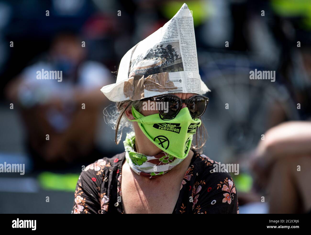 Berlin, Germany. 17th June, 2020. Demonstrators of Extinction Rebellion block the street in front of the headquarters of the German Association of the Automotive Industry (VDA). Credit: Fabian Sommer/dpa/Alamy Live News Stock Photo