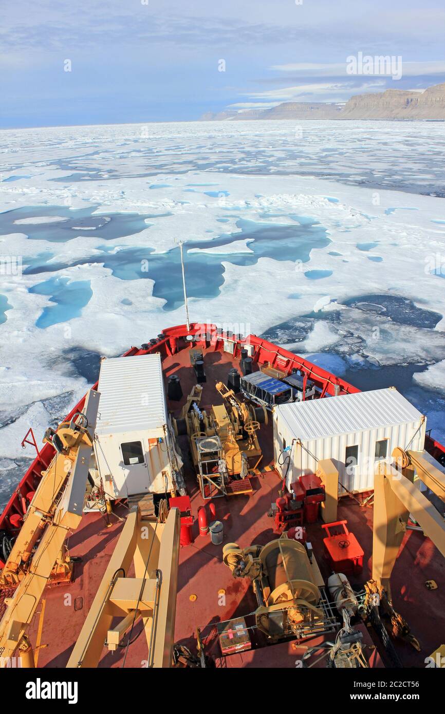 CCGS Amundsen as she breaks through the ice in Lancaster Sound, Arctic Canada Stock Photo