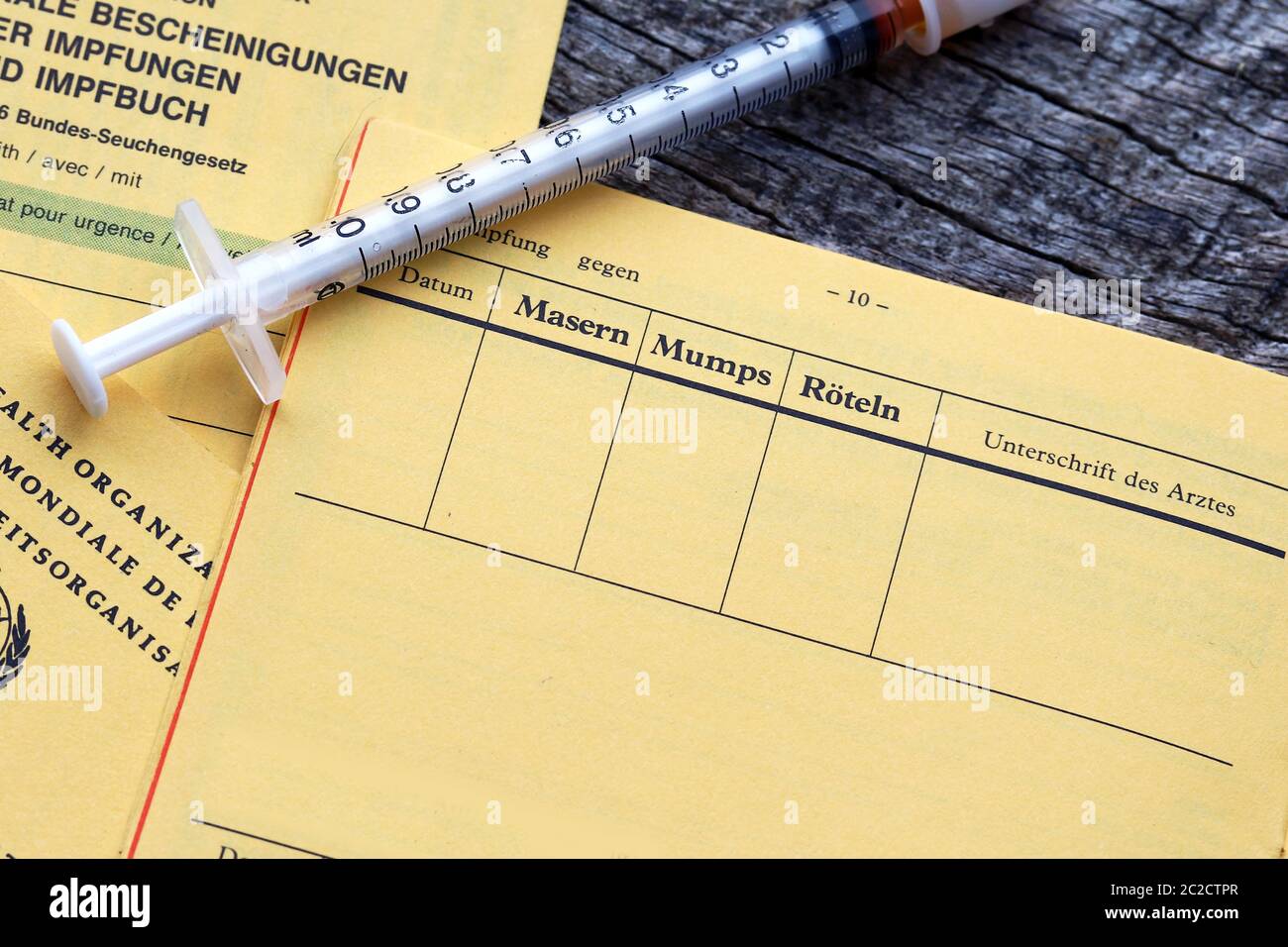 Vaccination against measles and other childhood diseases. Vaccination pass for vaccinations Stock Photo