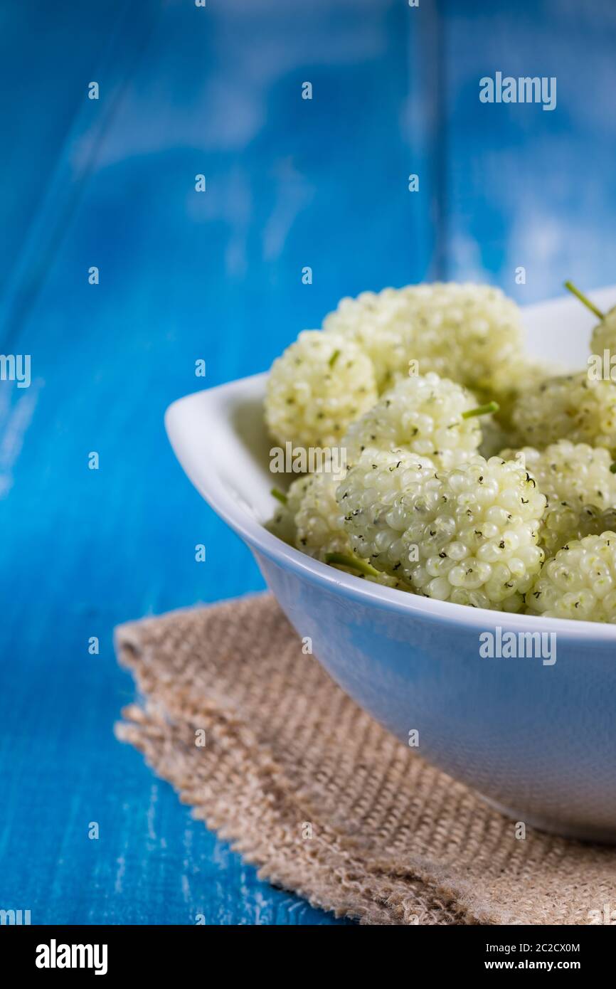 White mulberry on rustic board Stock Photo
