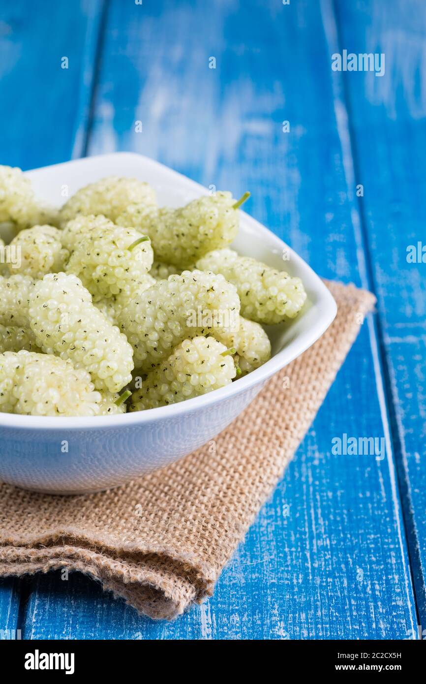 White mulberry on rustic board Stock Photo