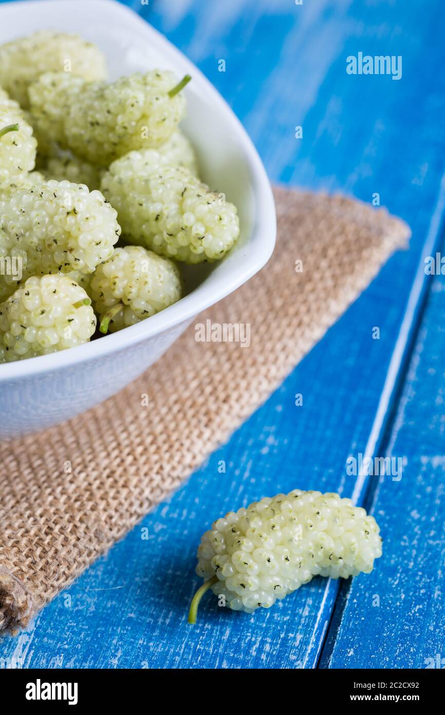 White mulberry on rustic board Stock Photo