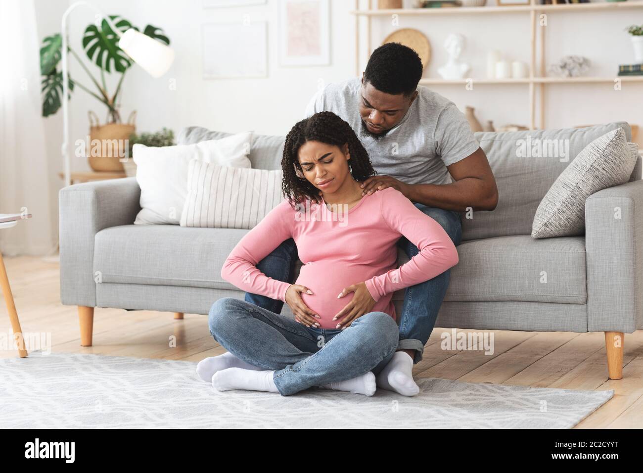 Pregnancy bump african woman hires stock photography and images Alamy