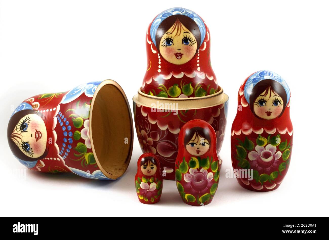 five traditional Russian matryoshka dolls on white background Stock