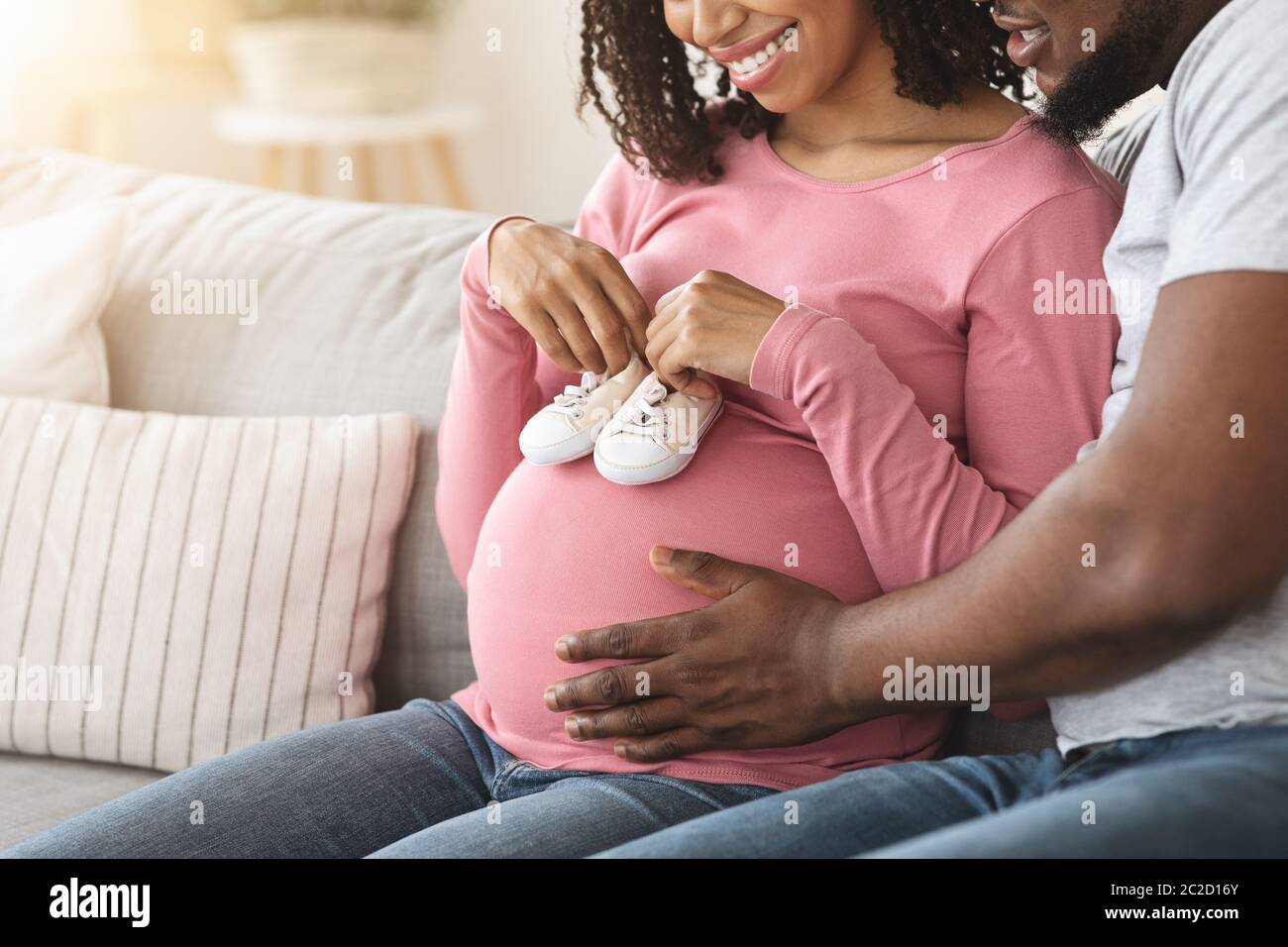 Closeup Of Loving Black Couple Holding Baby Footwear On Tummy Stock Photo Alamy Closeup Of Loving Black Couple Holding Baby Footwear On Tummy Stock Photo Alamy