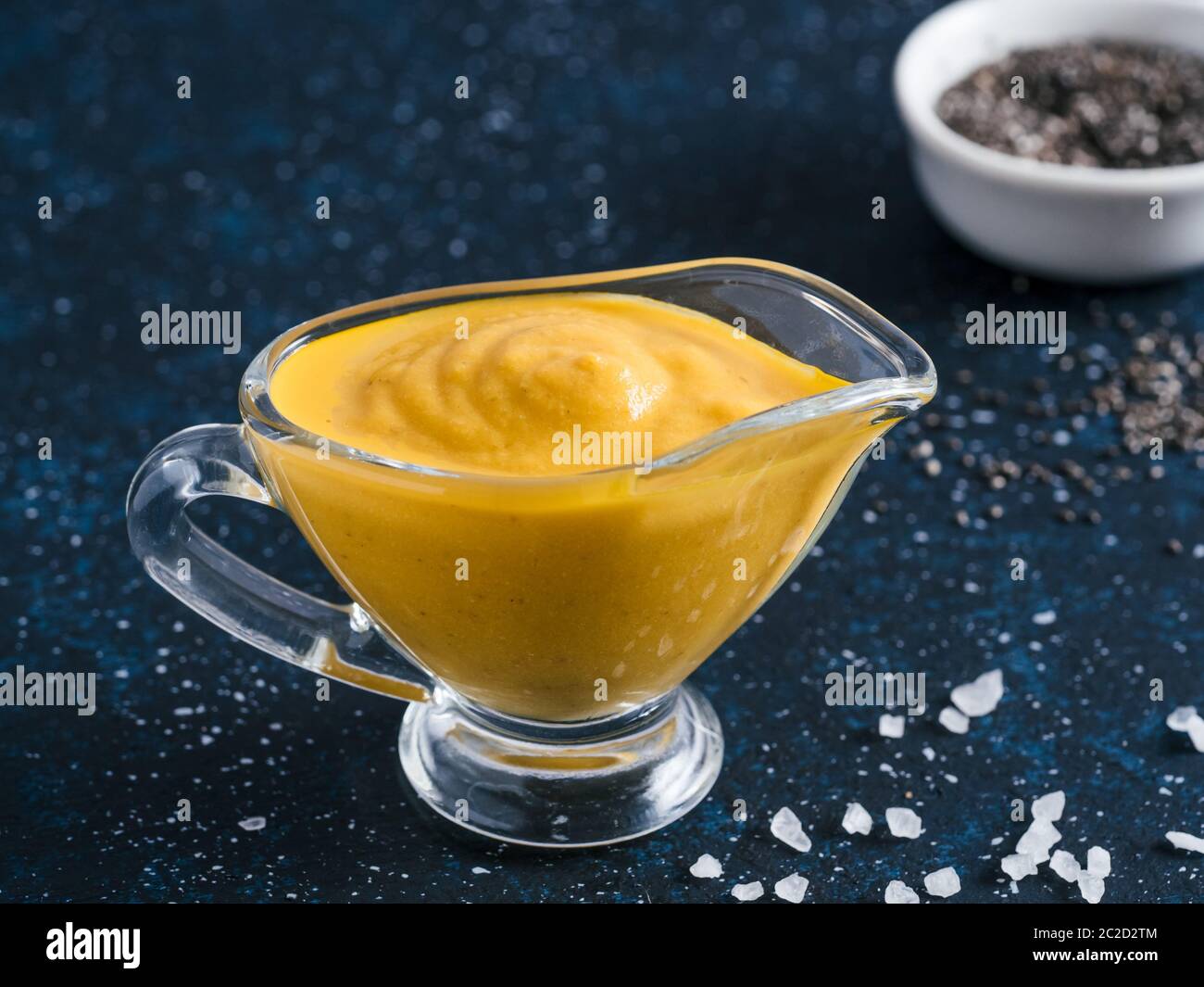 Vegan creamy cheddar cheese sauce with chia seeds Stock Photo Alamy