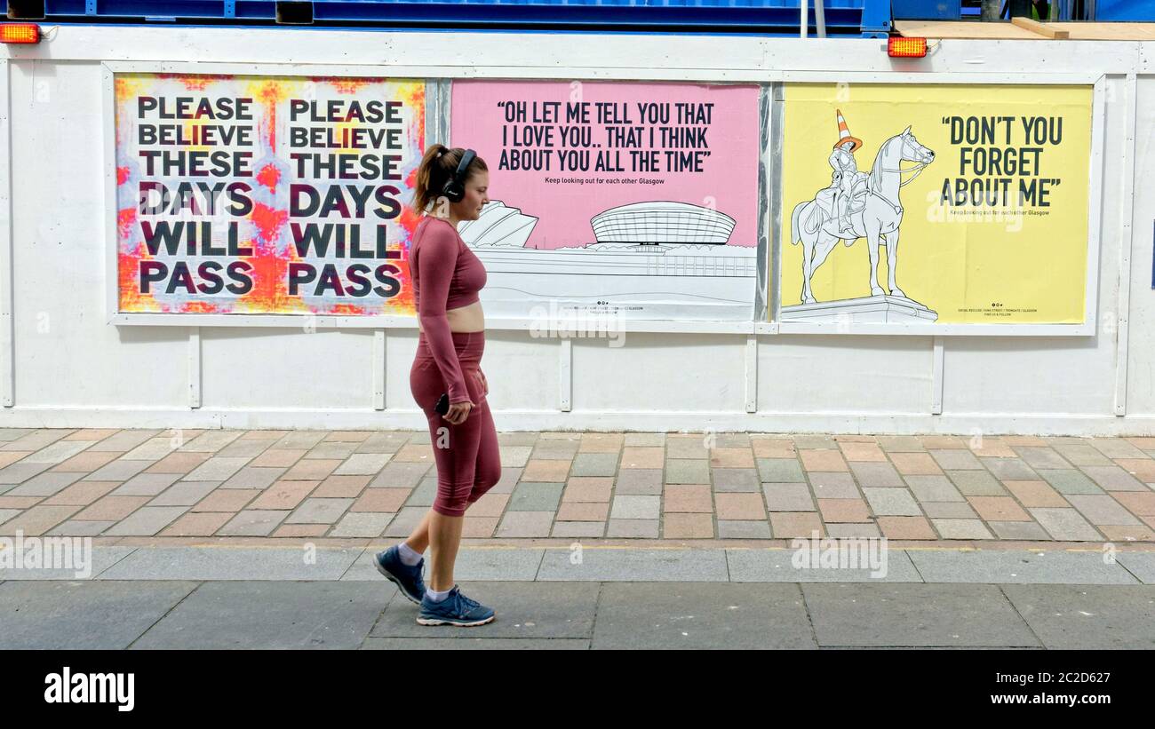 Glasgow, Scotland, UK 17th June, 2020: Coronavirus on the clyde walkway as an art instalation uses posters with titles from scottish songs to help people get through it, next to the river in city centre. Credit: Gerard Ferry/Alamy Live News Stock Photo