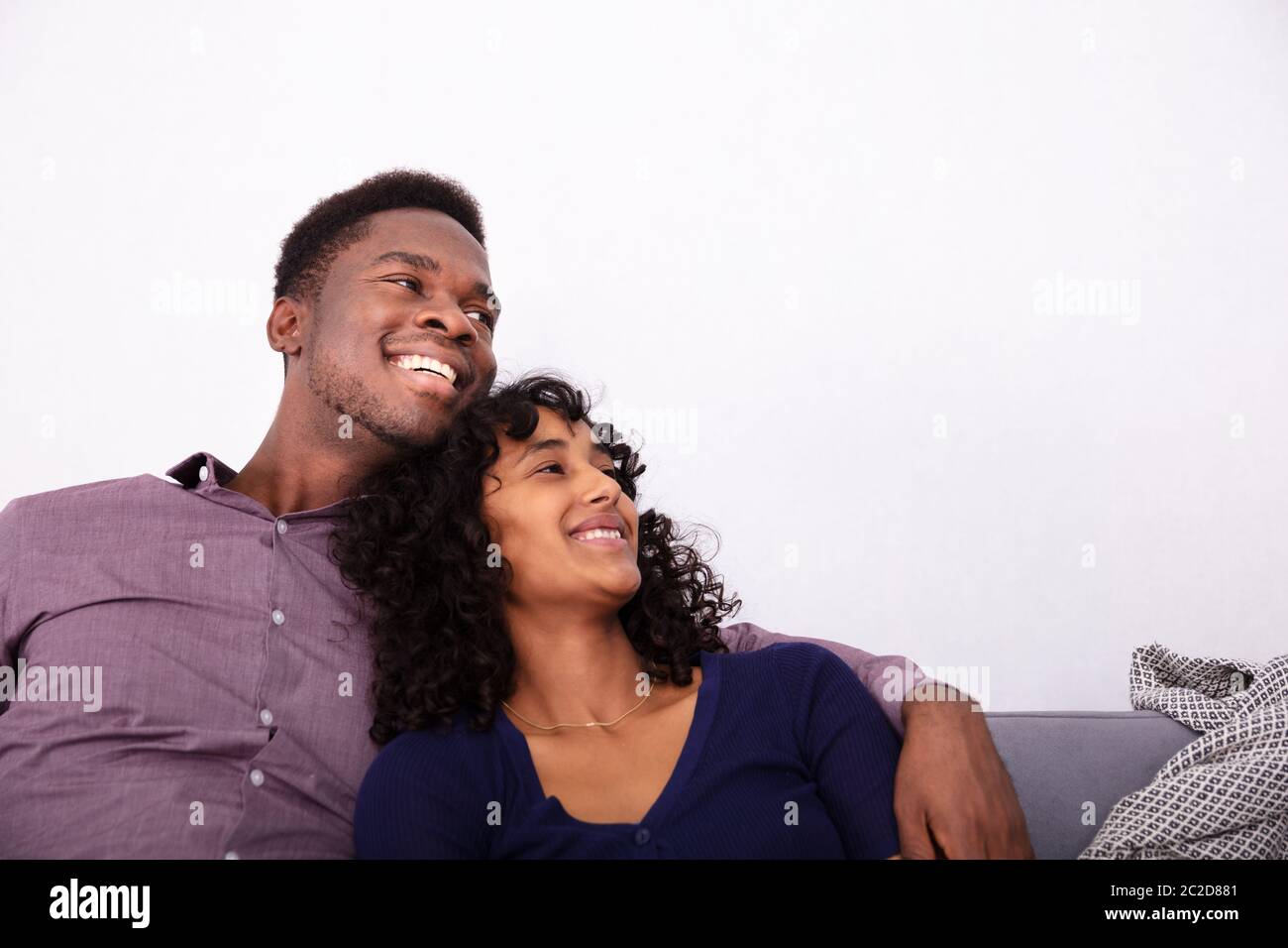 African couple sleeping on sofa hi-res stock photography and images - Alamy