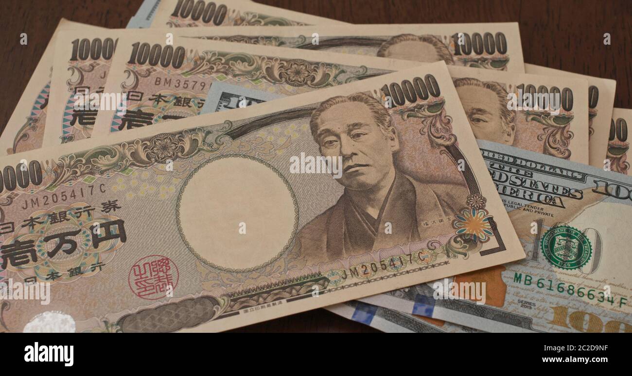 USD banknote and Japanese yen Stock Photo Alamy