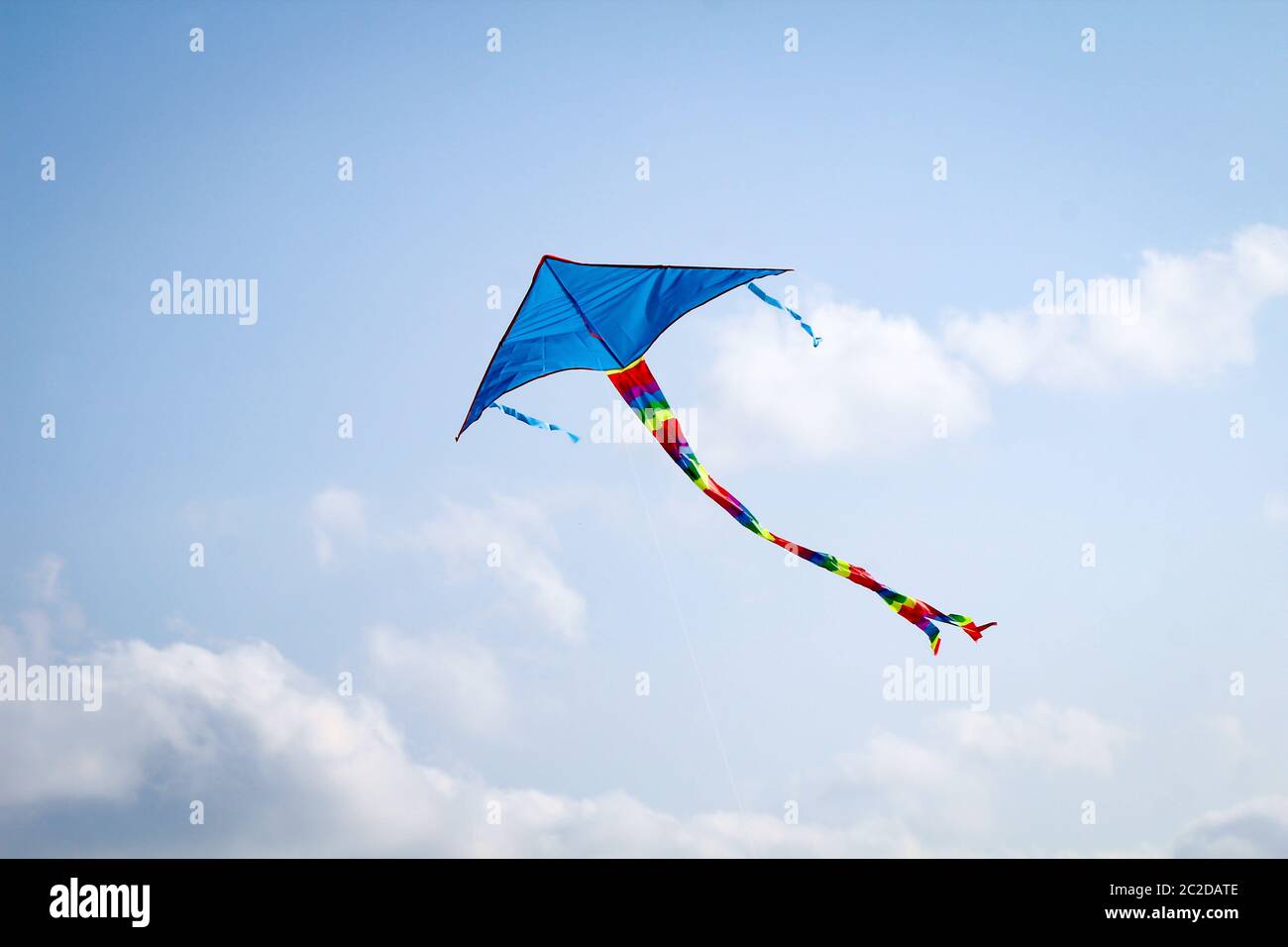 blue stunt kite in the sky at the baltic sea Stock Photo