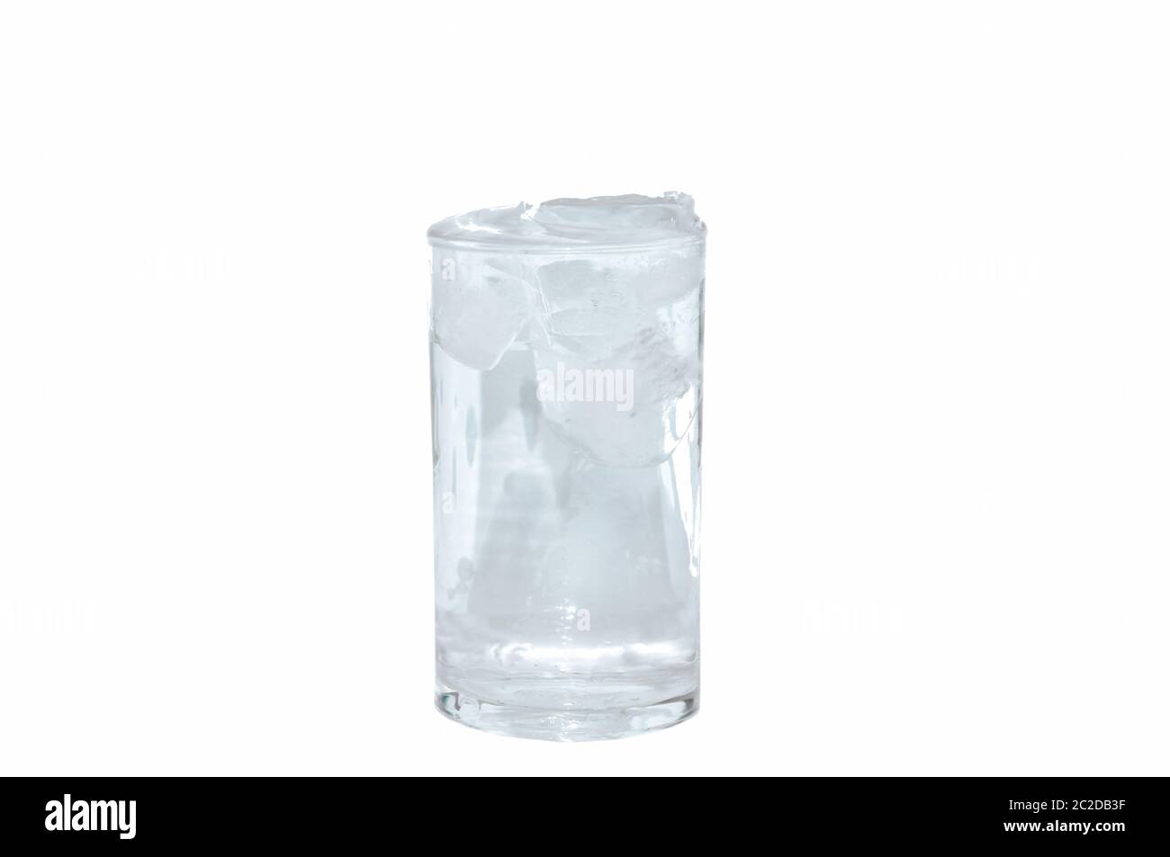 ice cube and water in glass on white background Stock Photo - Alamy