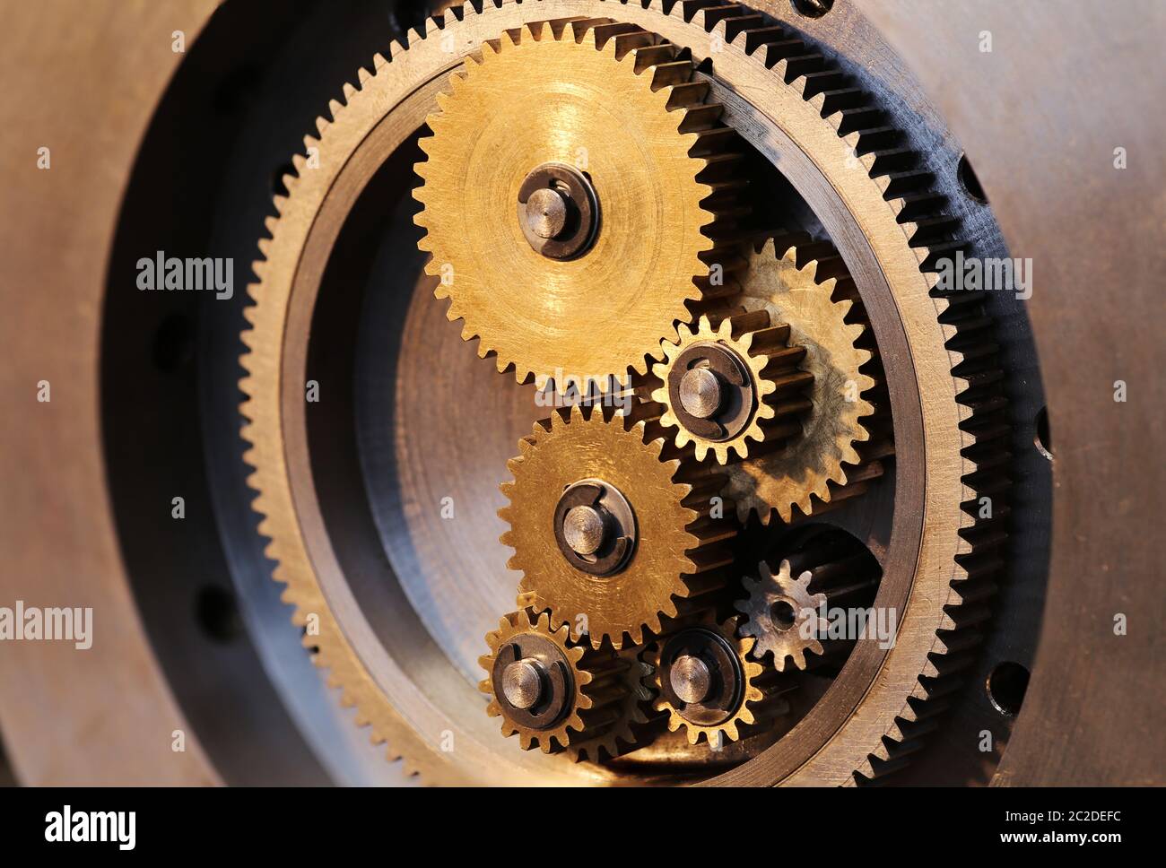 Brass gears of a locking mechanism Stock Photo