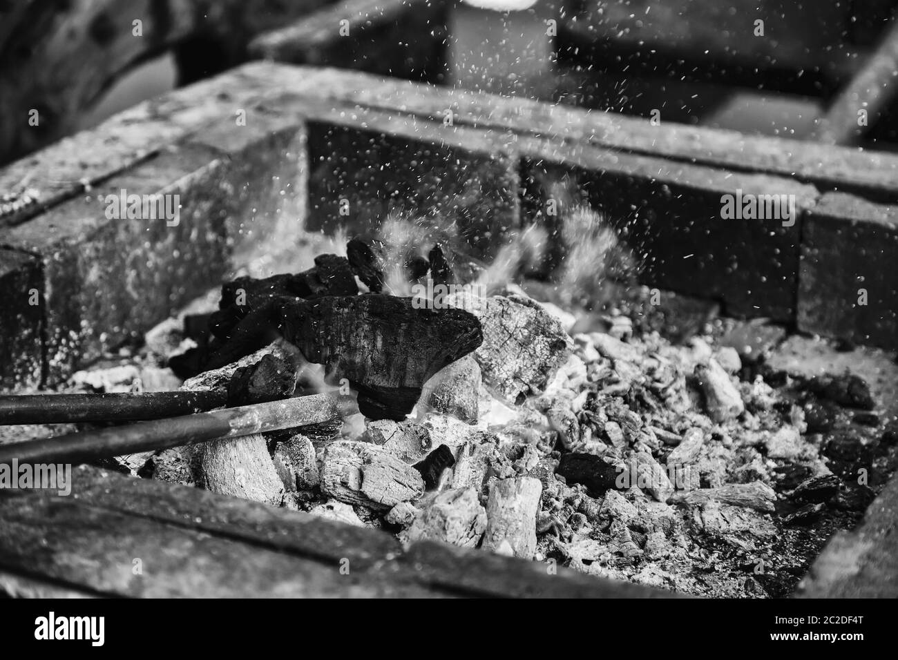 Burning embers, detail of fire and flame, carbon Stock Photo