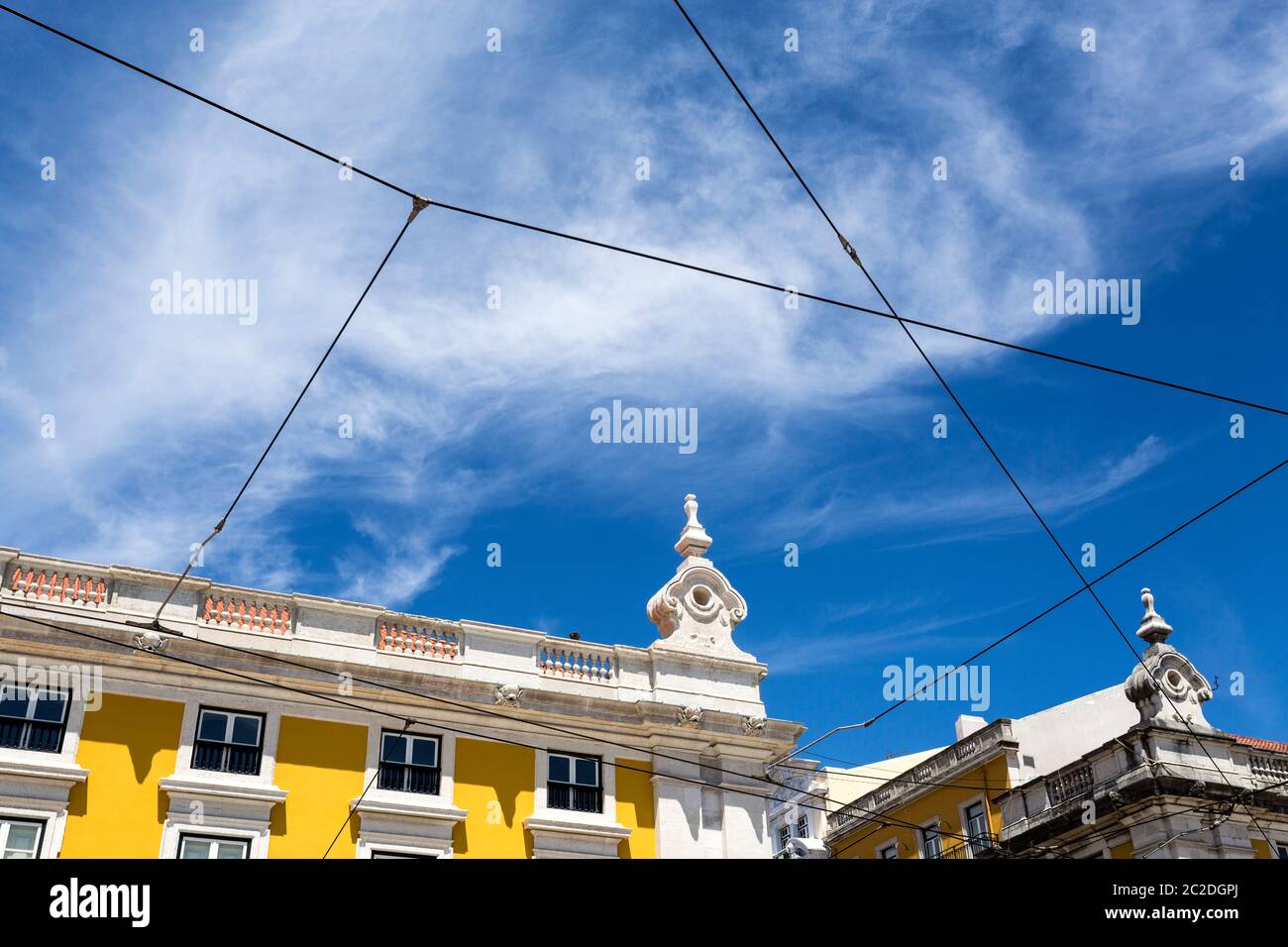 Detail of the elegant classic pombaline government buildings flanking three sides of the huge Commerce Square built after the 1755 earthquake in Lisbo Stock Photo