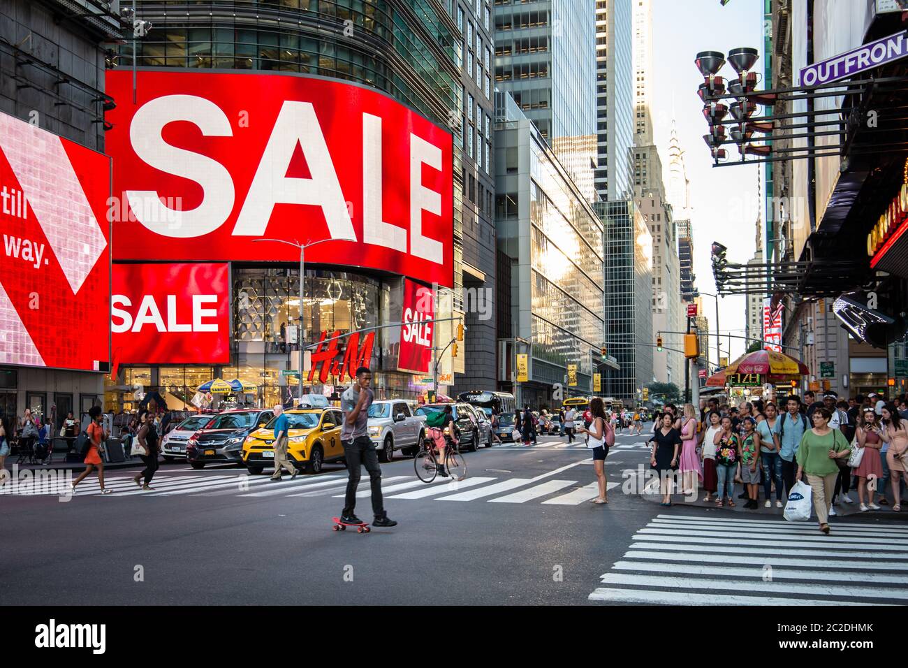 New York City / USA - JUL 13 2018: Times Square street view at rush hour in midtown Manhattan Stock Photo