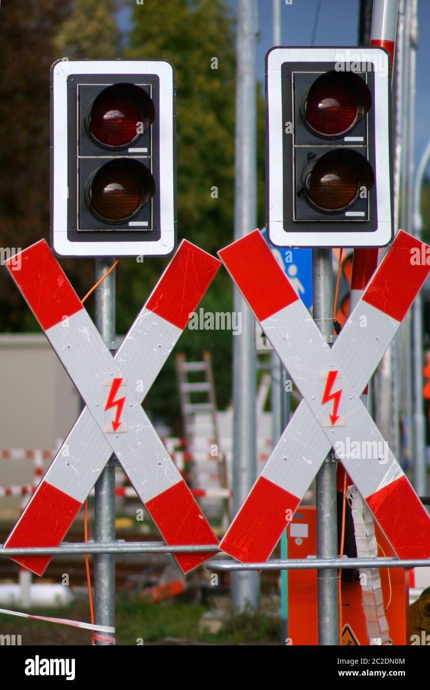 New St. Andrews crosses and signal lights at a rail construction site. Stock Photo