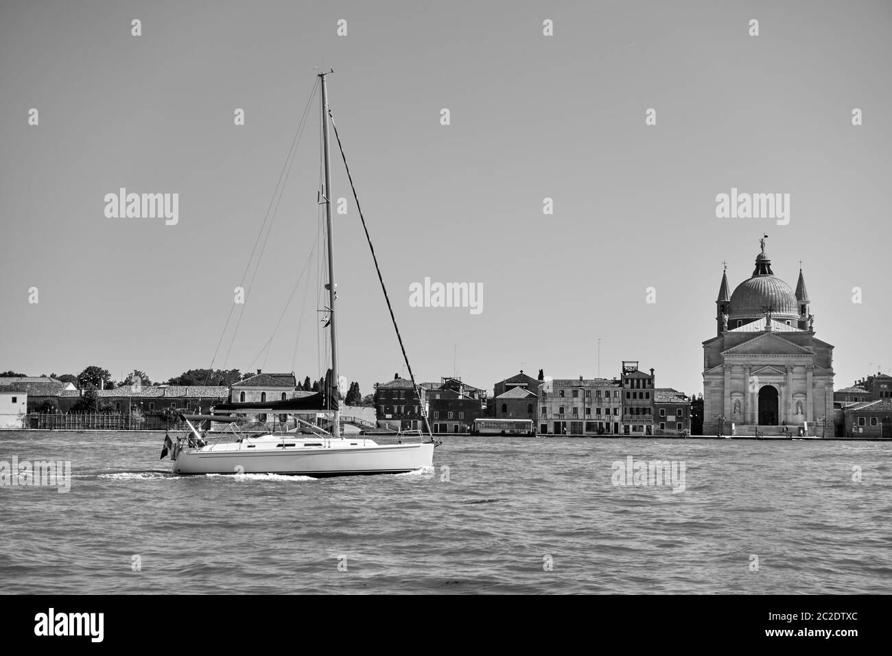 Black and white view of Venice with yacht and Giudecca island, Italy.  Venetian landscape Stock Photo