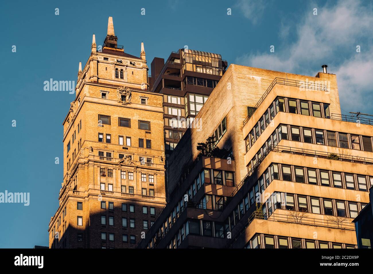 Closeup view of old and modern apartment building in Midtown Manhattan