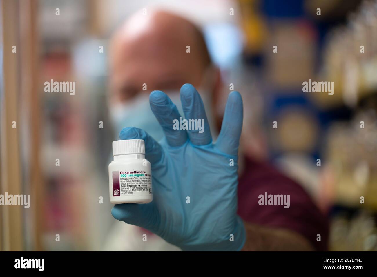 (200617) -- MANCHESTER, June 17, 2020 (Xinhua) -- A staff member holds packages of dexamethasone at a pharmacy in Manchester, Britain, on June 17, 2020. With the COVID-19 pandemic imposing huge impact on people's daily life in Britain and other parts of the world, scientists are racing against time to get deeper understanding of the novel coronavirus while accelerating the development of new treatments and vaccines. Credit: Xinhua/Alamy Live News Stock Photo