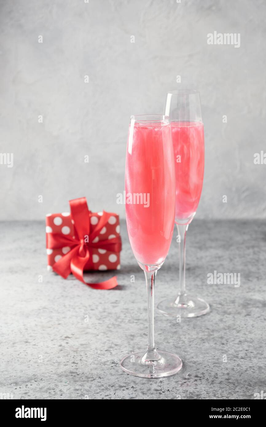 Shimmer Edible Glitter Sparkling Wine In Two Glasses With Gift On Grey Stock Photo Alamy