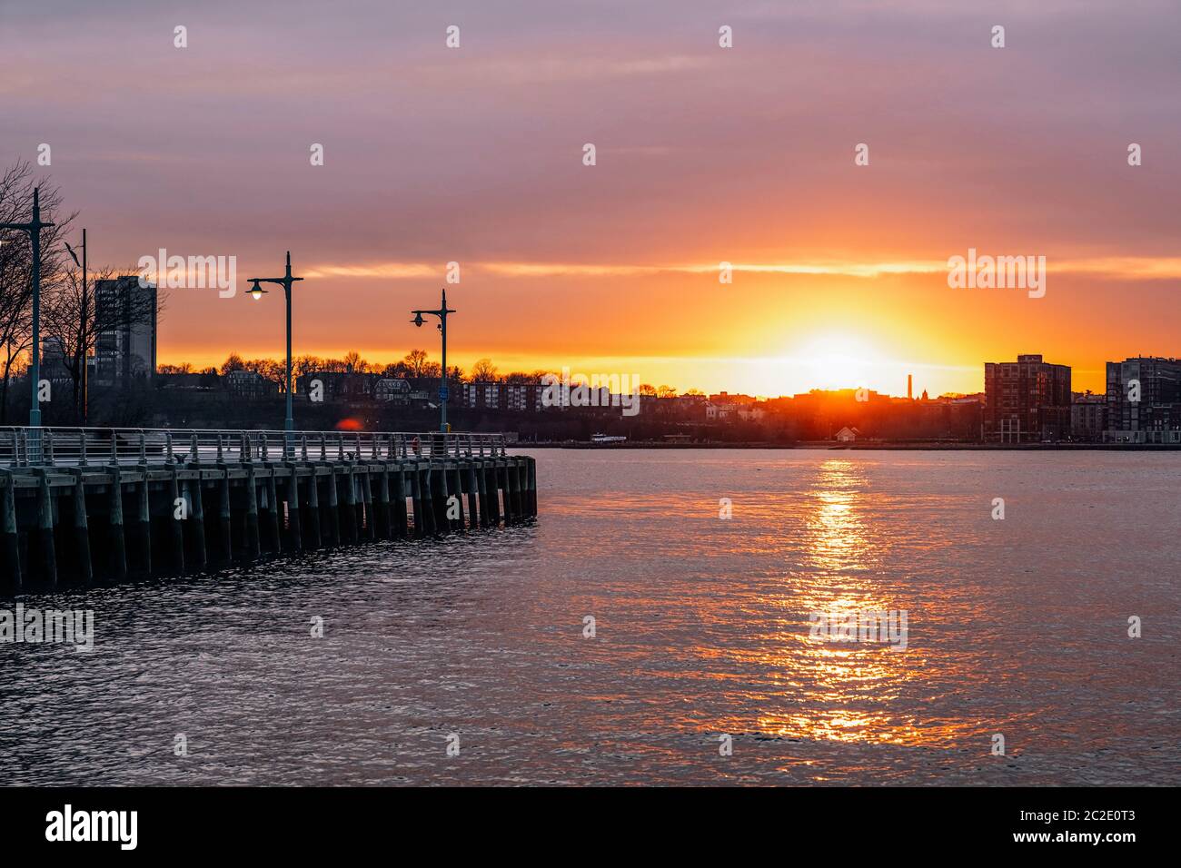 Sunset view of Jersey skyline from Pier 64 in Chelsea New York City Stock Photo