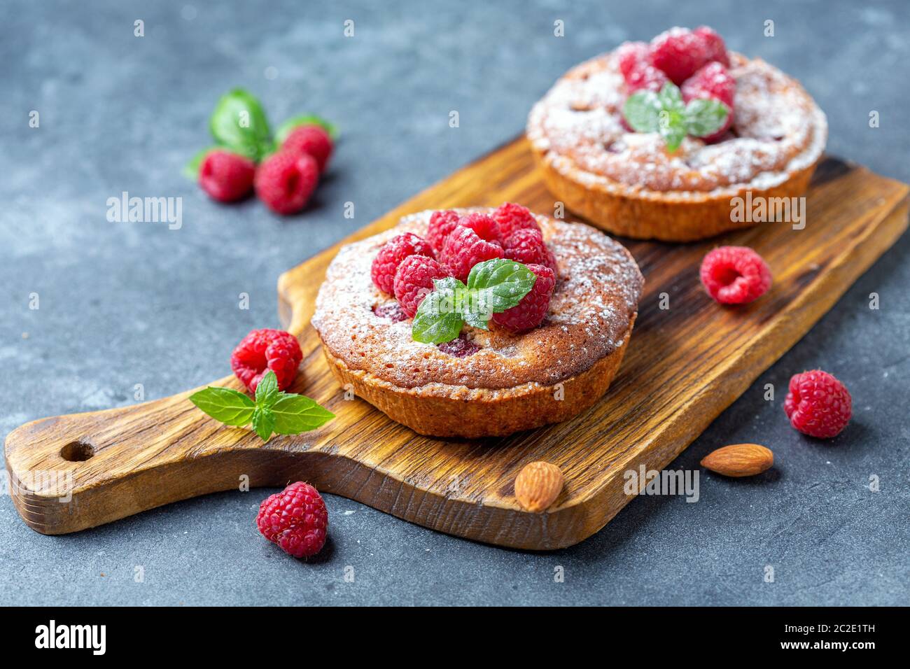 Delicious raspberry mini tarts (tartlets Stock Photo - Alamy
