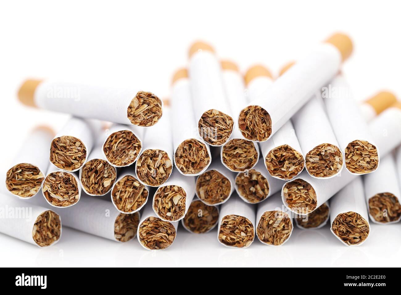 Heap of cigarettes on white background Stock Photo
