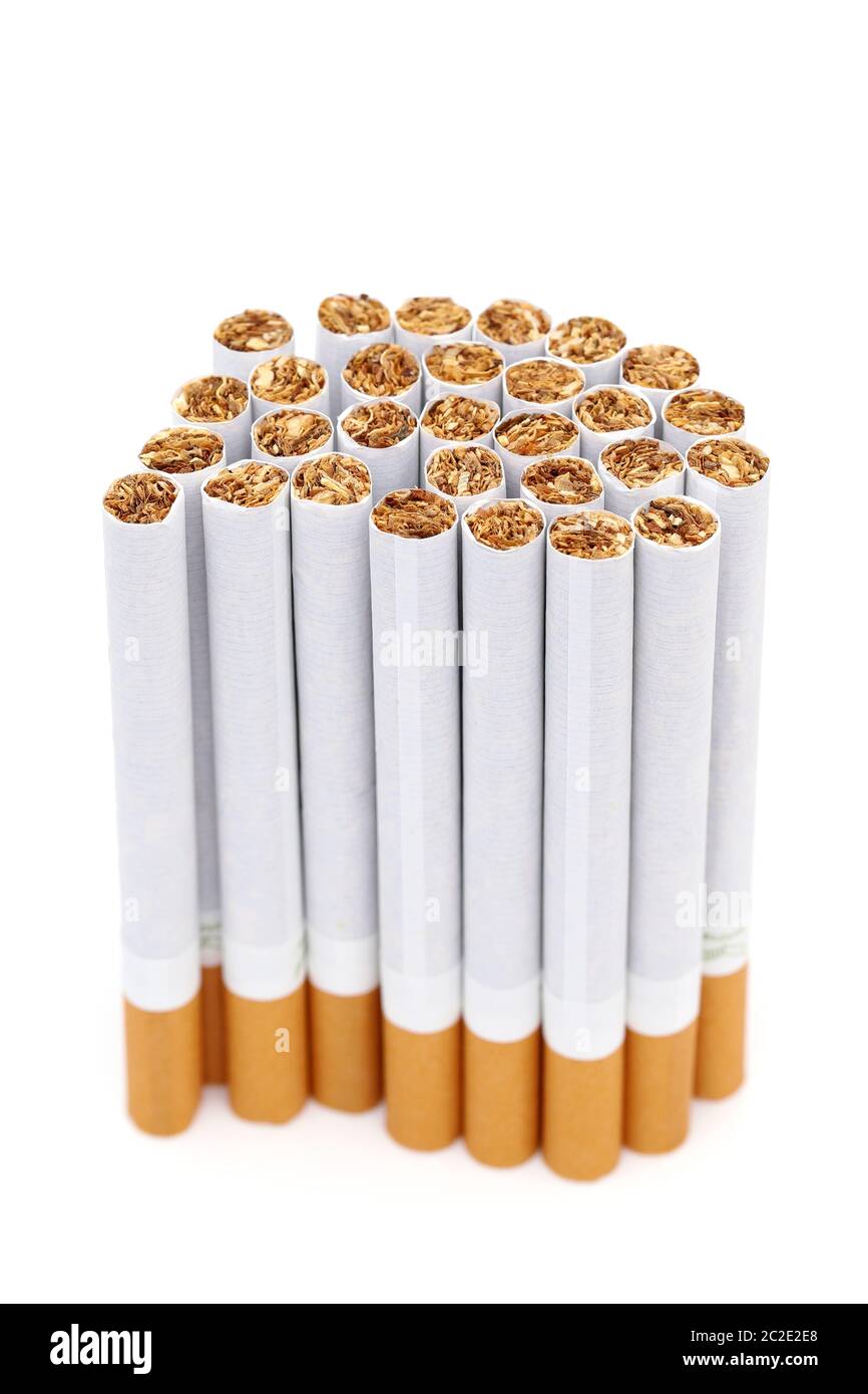many cigarettes standing on a white background Stock Photo