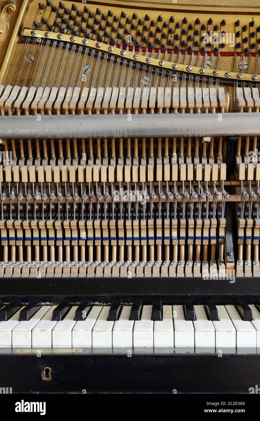 inside the piano: string, pins and hammers Stock Photo