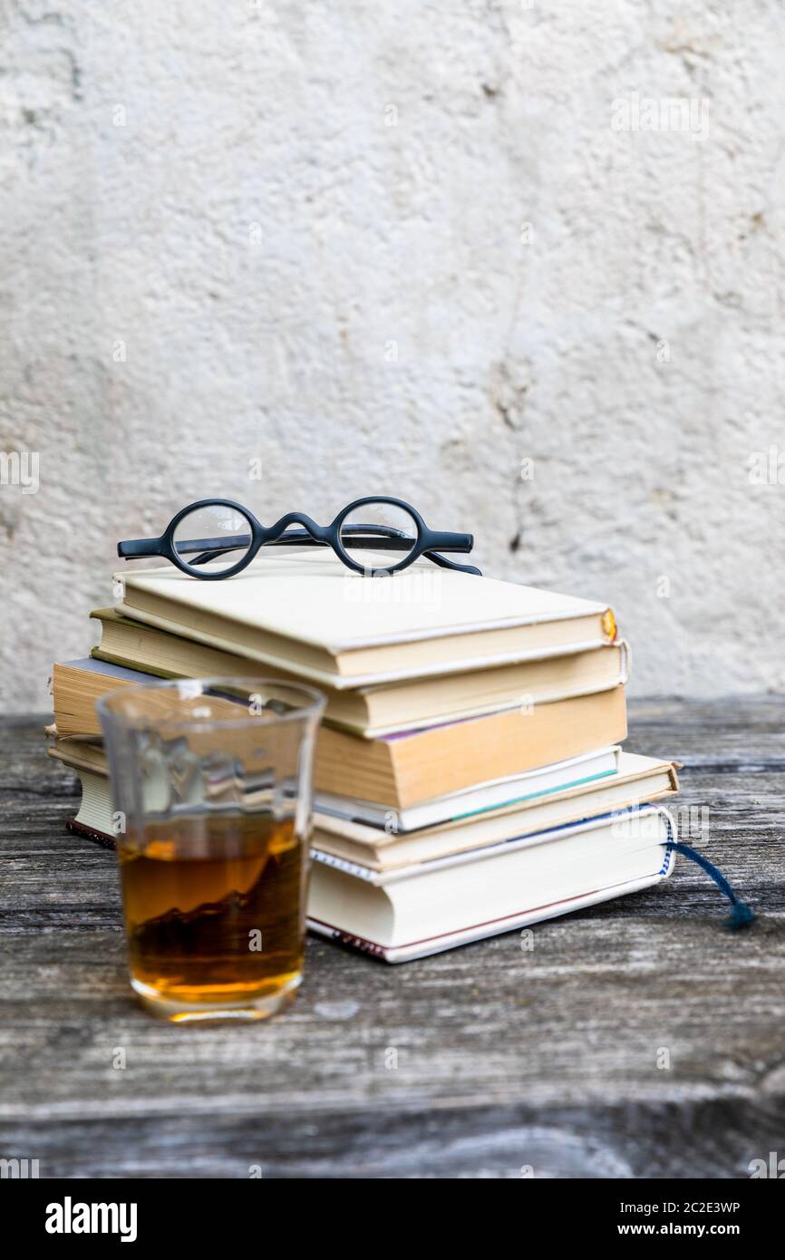 books and reading glasses Stock Photo