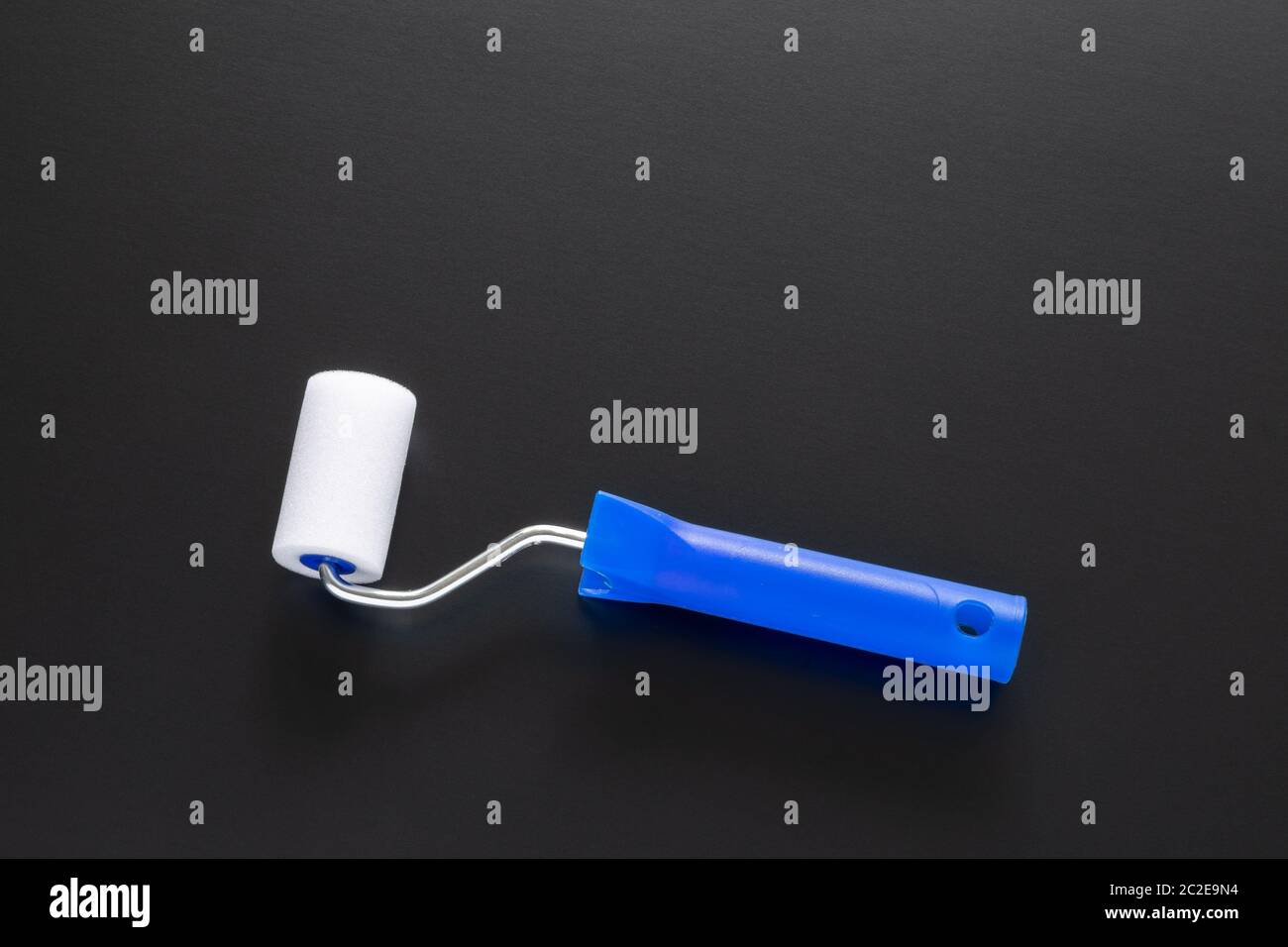 painting roller isolated on black background Stock Photo