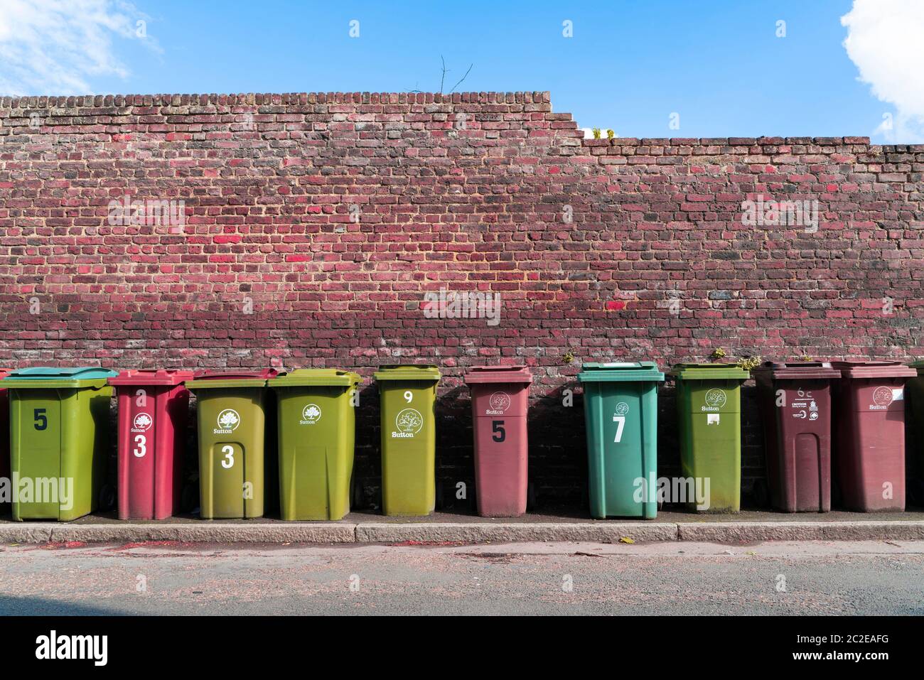Rubbish Bins Lined Up Stock Photo - Alamy