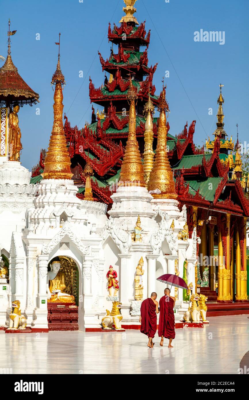 Buddhist Monks At The Shwedagon Pagoda, Yangon, Myanmar. Stock Photo