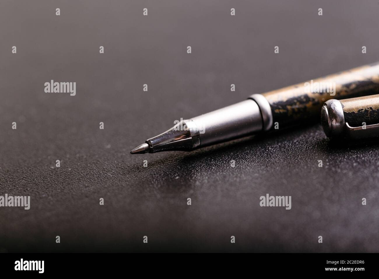 automatic plastic ballpoint pen with clipping path on black background. close up. Stock Photo