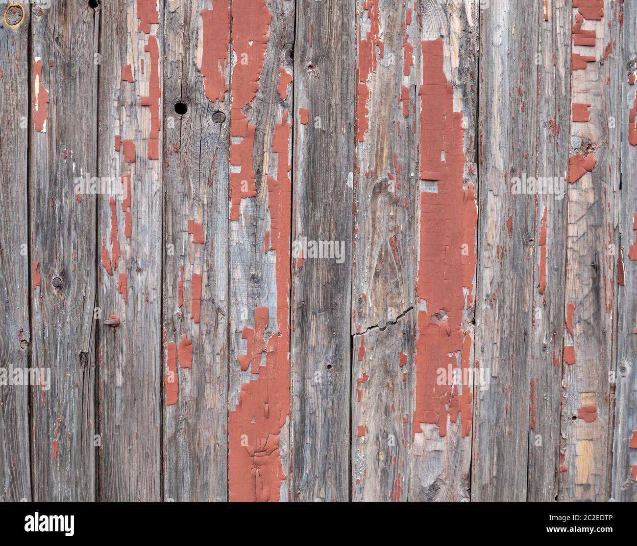 Peeling off an old wooden wall Stock Photo