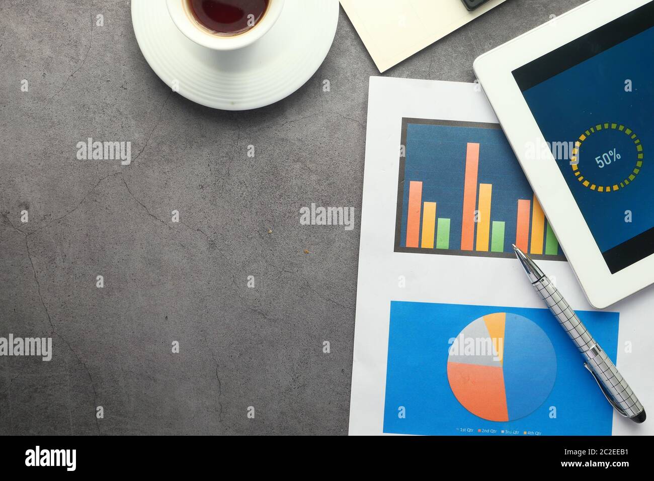 financial graph and digital tablet on table, using self created chart  Stock Photo