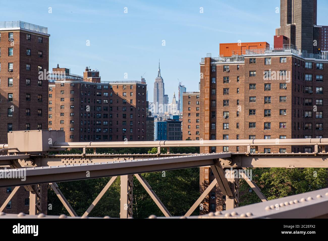 East View Lower Manhattan east view from Brooklyn Bridge in summer sunny daylight ...