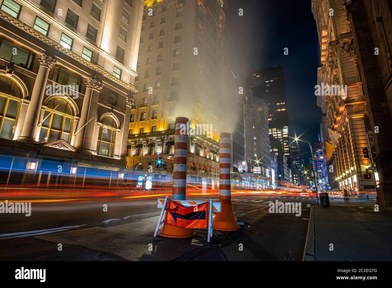 Fifth Avenue at night with light trail in New York City Stock Photo