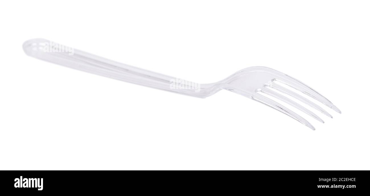 Transparent plastic fork isolated on white background Stock Photo