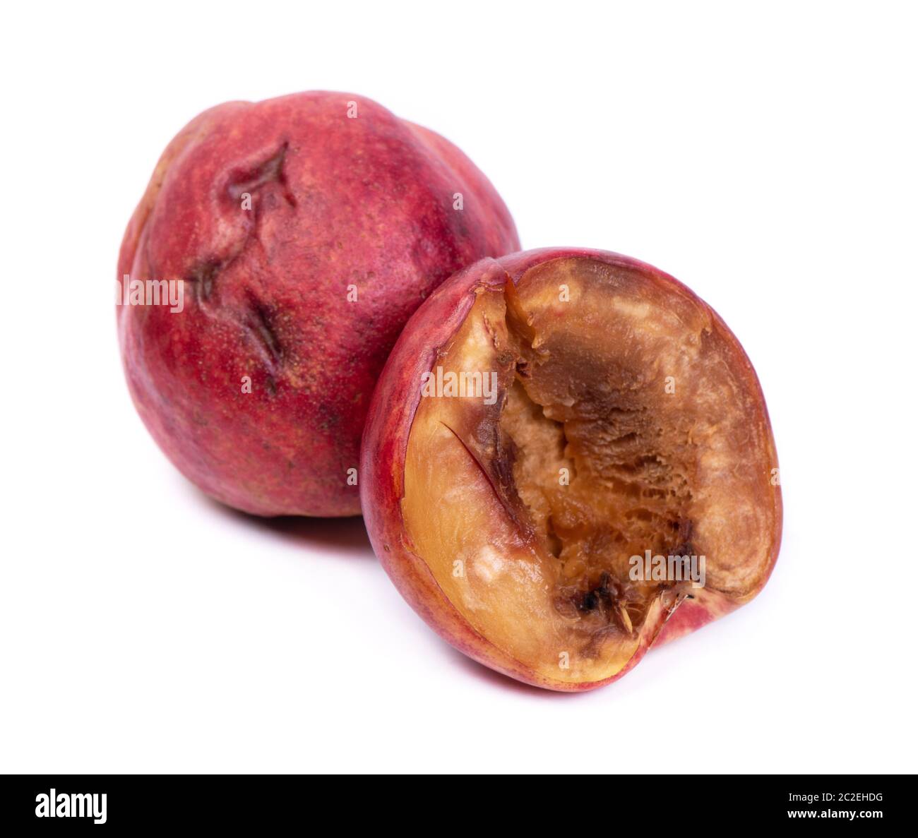 Group of rotten nectarines isolated on white background Stock Photo Alamy