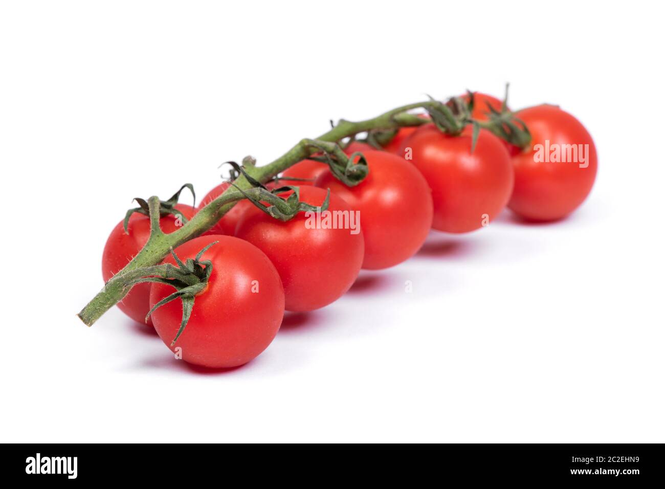 Ripe fresh cherry tomatoes on branch isolated on white background Stock ...