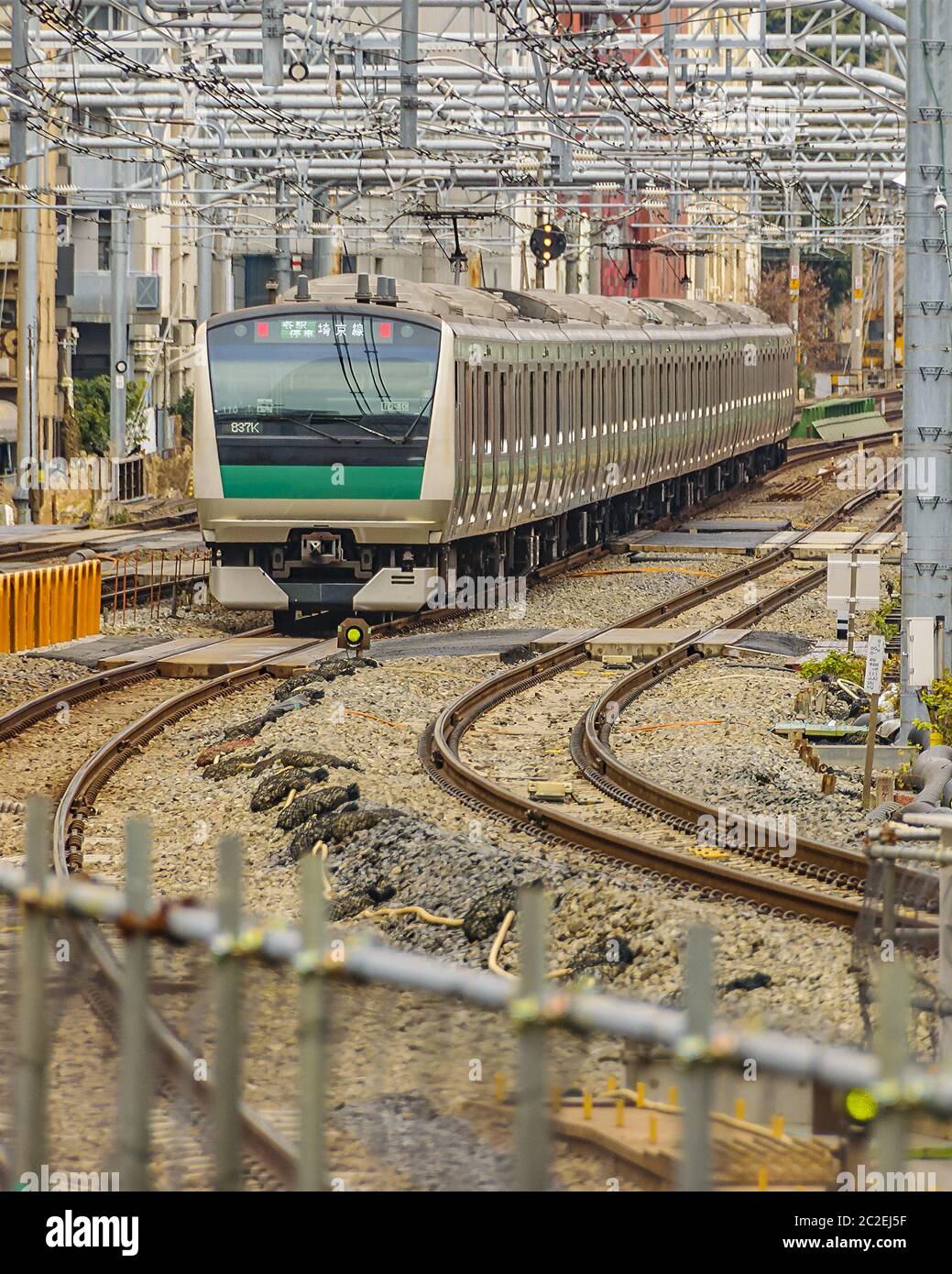 Train Arriving to Station, Tokyo, Japan Stock Photo