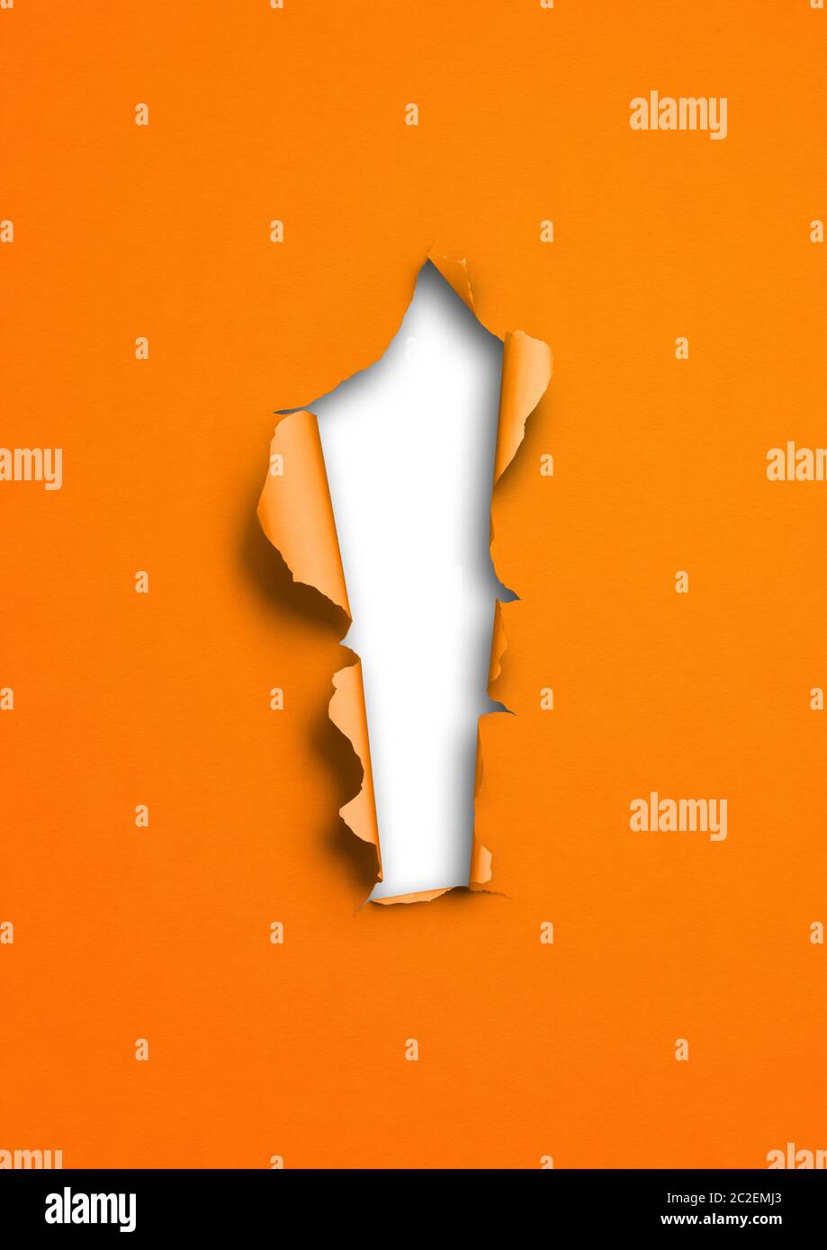 Orange torn paper with hole. blank background template Stock Photo